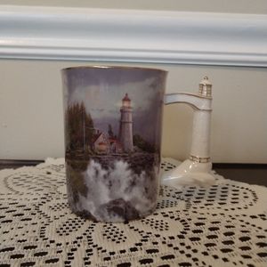 2003 Thomas Kinkade Conquering the Storms Porcelain Mug with Lighthouse Handle
